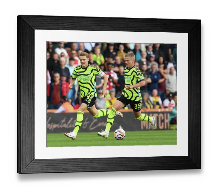 Framed Print : Arsenal's Zinchenko and Odegaard in Action against AFC Bournemouth (2023-24)