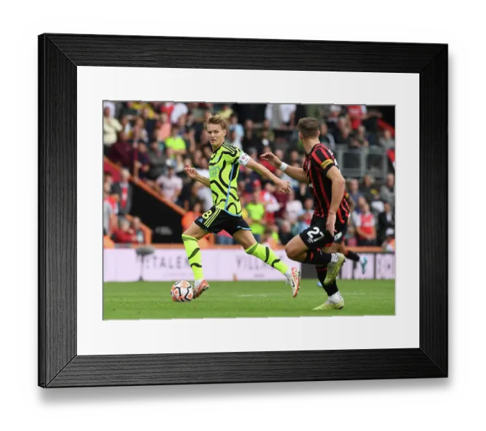 Framed Print : Arsenal's Martin Ødegaard Fends Off Bournemouth's Pressure in Premier League Clash (AFC Bournemouth vs Arsenal, 2023-24) Framed Print : Arsenal's Martin Ødegaard Fends Off Bournemouth's Pressure in Premier League Clash (AFC Bournemouth vs Arsenal, 2023-24)