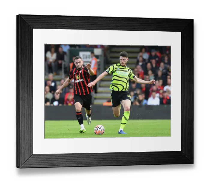 Framed Print : Arsenal's Declan Rice Fends Off Bournemouth's Lewis Cook Pressure in 2023-24 Premier League Clash Framed Print : Arsenal's Declan Rice Fends Off Bournemouth's Lewis Cook Pressure in 2023-24 Premier League Clash