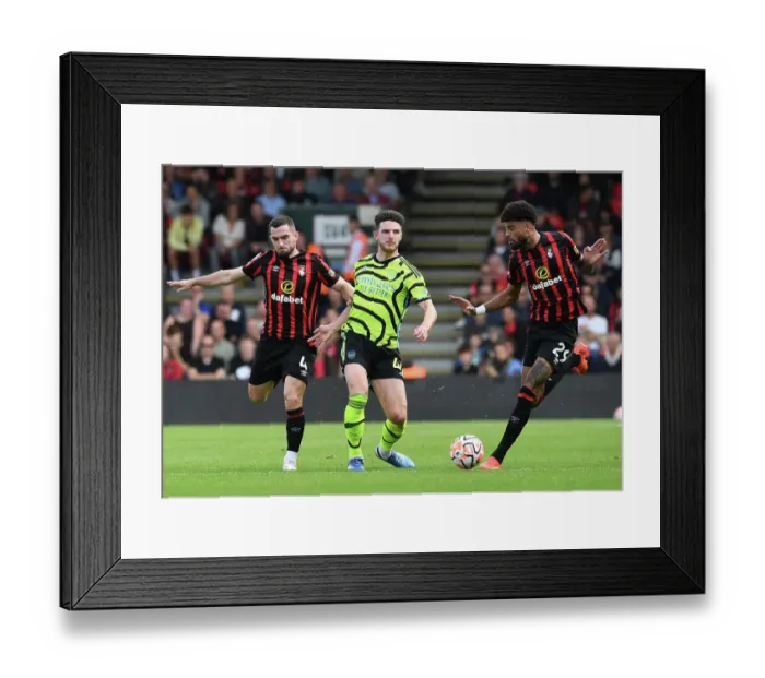 Framed Print : Arsenal's Rice Thrives Under Pressure Against Bournemouth in 2023-24 Premier League Clash