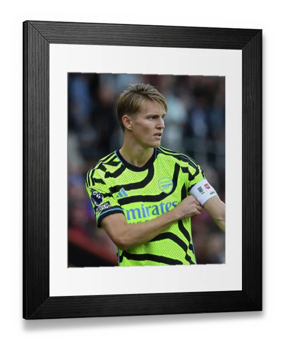 Framed Print : Martin Odegaard: Arsenal's Midfield Genius Shines in Premier League Triumph vs. AFC Bournemouth