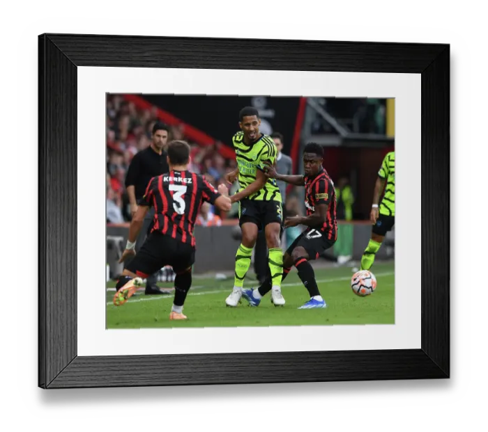 Framed Print : Arsenal's William Saliba Faces Pressure from Bournemouth's Luis Sinisterra in Premier League Clash (AFC Bournemouth vs Arsenal 2023-24)