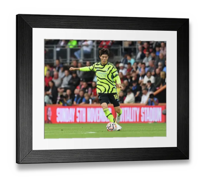 Framed Print : Arsenal's Tomiyasu in Action against AFC Bournemouth in 2023-24 Premier League Framed Print : Arsenal's Tomiyasu in Action against AFC Bournemouth in 2023-24 Premier League