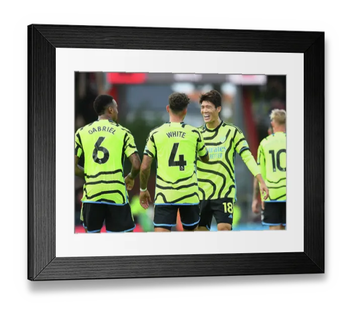 Framed Print : Arsenal's Ben White and Takehiro Tomiyasu Celebrate Fourth Goal Against AFC Bournemouth (2023-24)