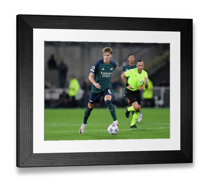 Framed Print : Arsenal's Martin Ødegaard in Action against RC Lens in 2023-24 UEFA Champions League Framed Print : Arsenal's Martin Ødegaard in Action against RC Lens in 2023-24 UEFA Champions League