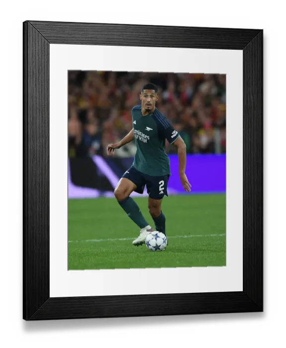 Framed Print : William Saliba's Defensive Masterclass: Arsenal's Impressive Performance in RC Lens's UEFA Champions League Showdown