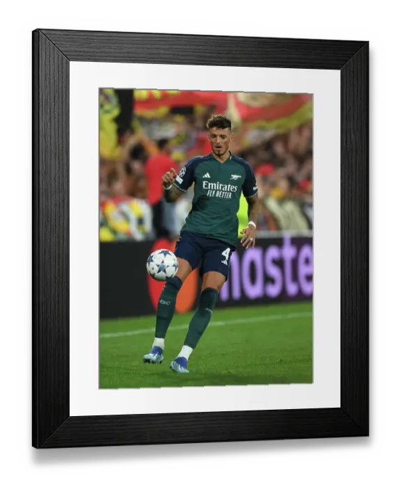 Framed Print : Arsenal's Ben White in Action: 2023-24 UEFA Champions League Match vs RC Lens Framed Print : Arsenal's Ben White in Action: 2023-24 UEFA Champions League Match vs RC Lens