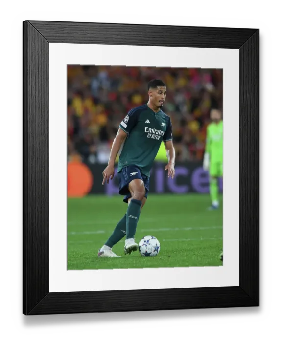 Framed Print : William Saliba in Action: Arsenal vs. RC Lens, UEFA Champions League 2023 / 24
