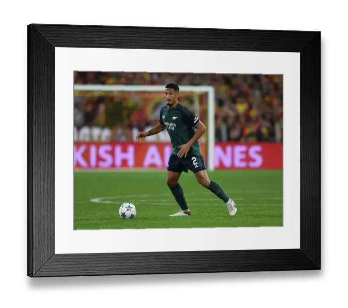 Framed Print : William Saliba's Brilliant Performance: Arsenal's Defensive Maestro Shines in RC Lens Champions League Clash Framed Print : William Saliba's Brilliant Performance: Arsenal's Defensive Maestro Shines in RC Lens Champions League Clash