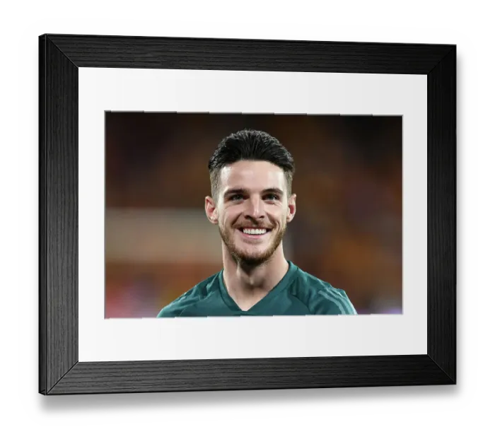 Framed Print : Declan Rice's Intense Focus: Arsenal's Midfield Maestro Before RC Lens Showdown in 2023-24 UEFA Champions League