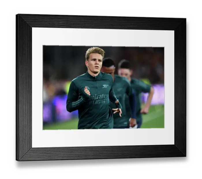 Framed Print : Martin Odegaard Gears Up: Arsenal's Star Prepares for RC Lens Showdown in UEFA Champions League Framed Print : Martin Odegaard Gears Up: Arsenal's Star Prepares for RC Lens Showdown in UEFA Champions League