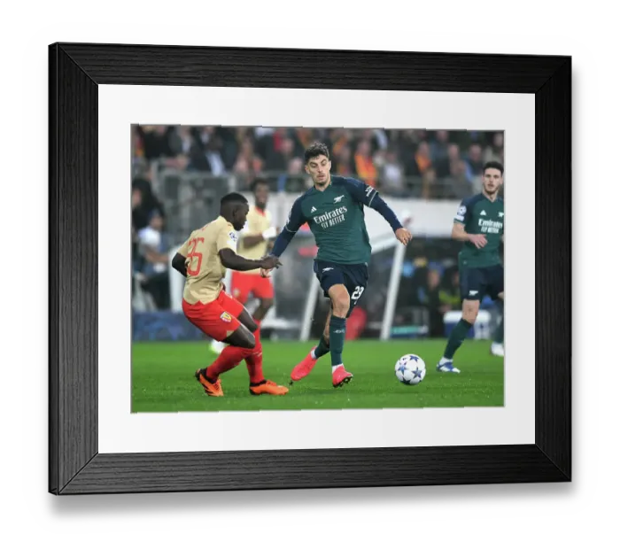 Framed Print : Havertz Overpowers RC Lens Defenders: Arsenal's Star Shines in Champions League Showdown Framed Print : Havertz Overpowers RC Lens Defenders: Arsenal's Star Shines in Champions League Showdown