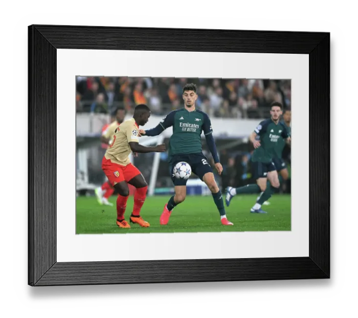 Framed Print : Champions Clash: Arsenal vs RC Lens in the UEFA Champions League at Stade Bollaert-Delelis (2023 / 24)