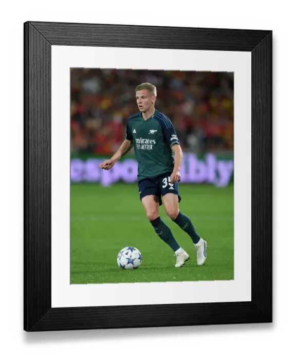 Framed Print : Arsenal's Oleksandr Zinchenko in Action against RC Lens in the 2023-24 UEFA Champions League