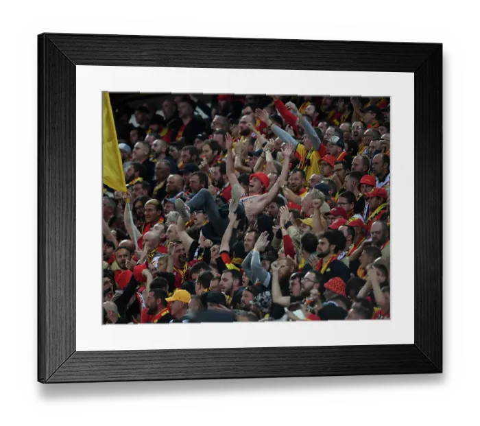 Framed Print : Champions League Thrills: Fan Surfing Euphoria - RC Lens vs. Arsenal