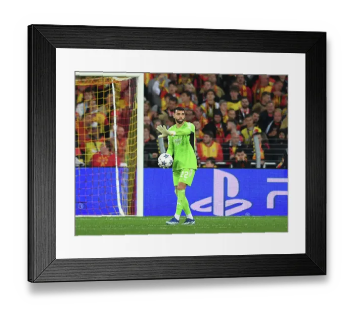 Framed Print : Arsenal's David Raya in Action: 2023-24 UEFA Champions League - RC Lens vs Arsenal
