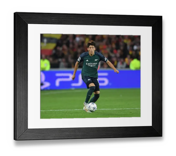 Framed Print : Champions League 2023-24: Arsenal's Tomiyasu Faces Off Against RC Lens at Stade Bollaert-Delelis Framed Print : Champions League 2023-24: Arsenal's Tomiyasu Faces Off Against RC Lens at Stade Bollaert-Delelis