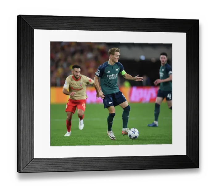 Framed Print : Martin Odegaard's Leadership: Arsenal's Champions League Victory over RC Lens (2023-24)
