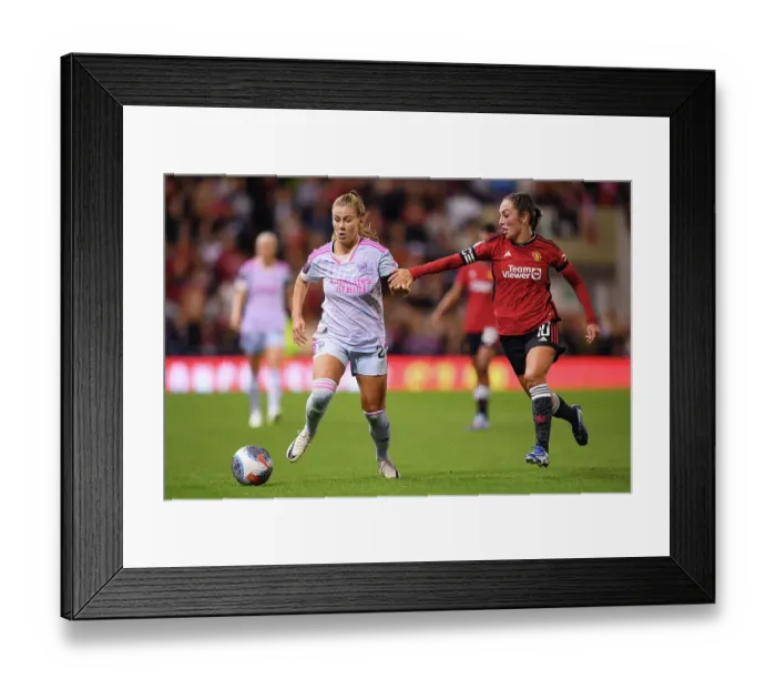 Framed Print : Battle for Possession: Manchester United vs. Arsenal FC - Women's Super League
