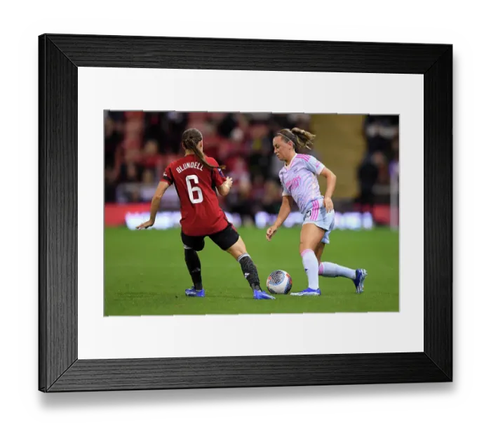 Framed Print : Arsenal's Katie McCabe Fights Past Manchester United's Hannah Blundell in Barclays Women's Super League Clash