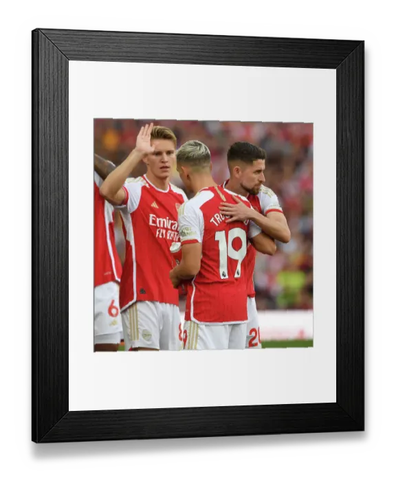 Framed Print : Arsenal FC vs Manchester City: Intense Pre-Match Focus on Trossard and Jorginho (2023-24)