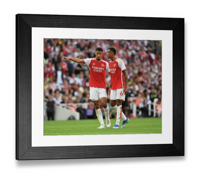 Framed Print : Arsenal's Unbeatable Duo: Saliba and Magalhaes in Action against Manchester City (2023-24) Framed Print : Arsenal's Unbeatable Duo: Saliba and Magalhaes in Action against Manchester City (2023-24)