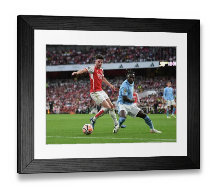 Framed Print : Arsenal vs Manchester City: Declan Rice Clash in the 2023-24 Premier League