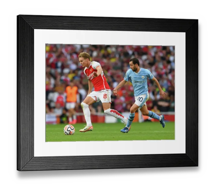 Framed Print : Arsenal's Martin Odegaard Faces Pressure from Manchester City's Bernardo Silva in 2023-24 Premier League Clash Framed Print : Arsenal's Martin Odegaard Faces Pressure from Manchester City's Bernardo Silva in 2023-24 Premier League Clash