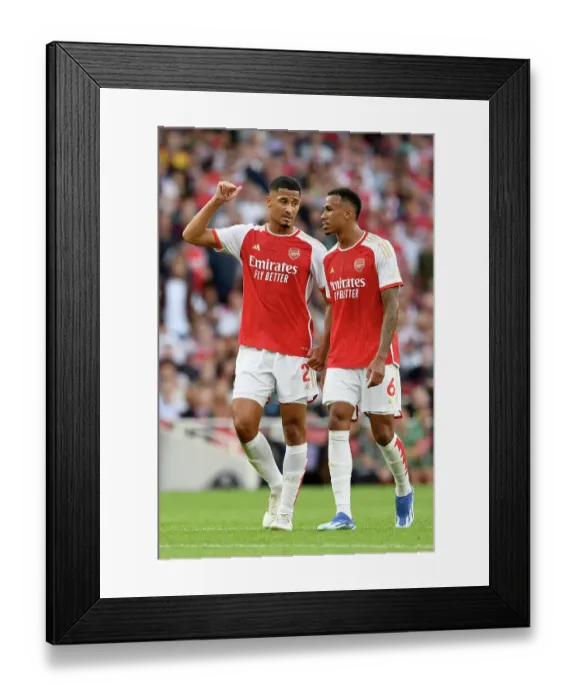 Framed Print : Arsenal's Saliba and Gabriel: A Moment of Connection Amidst the Arsenal v Manchester City Rivalry (2023-24) Framed Print : Arsenal's Saliba and Gabriel: A Moment of Connection Amidst the Arsenal v Manchester City Rivalry (2023-24)