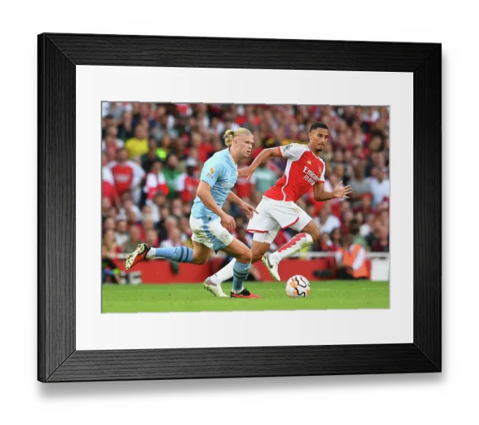 Framed Print : Arsenal's Saliba Faces Haaland Pressure: Arsenal FC vs Manchester City, 2023-24 Premier League
