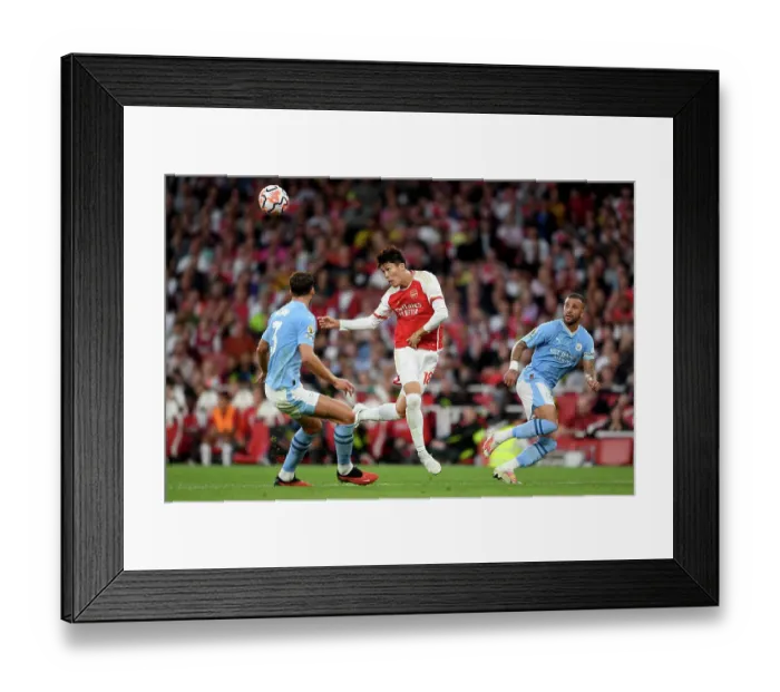 Framed Print : Arsenal vs Manchester City: Tomiyasu Fends Off Walker in Intense Premier League Clash (2023-24) Framed Print : Arsenal vs Manchester City: Tomiyasu Fends Off Walker in Intense Premier League Clash (2023-24)