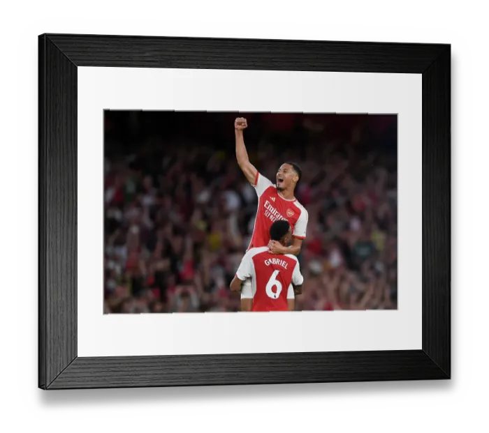 Framed Print : Arsenal's Premier League Victory: Saliba and Gabriel's Jubilant Moment (2023-24)