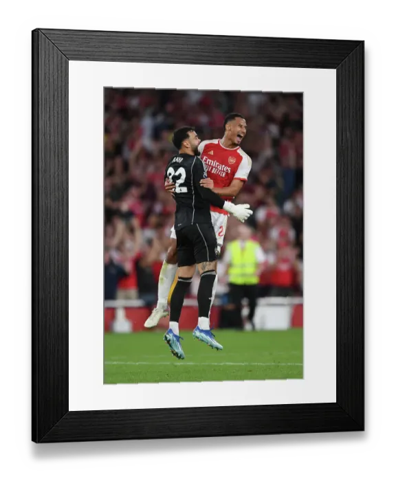 Framed Print : Arsenal Clinches Premier League Victory Over Manchester City (2023-24): David Raya and William Saliba's Jubilant Celebration