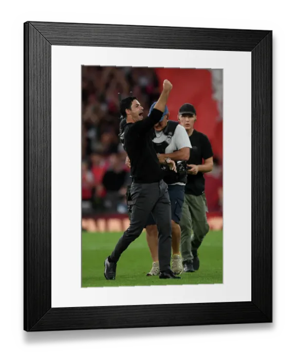 Framed Print : Arsenal's Historic Victory: Mikel Arteta Celebrates Triumph over Manchester City (2023-24)