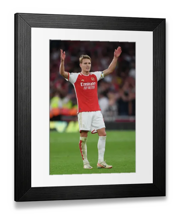 Framed Print : Arsenal Clinch Premier League Victory Over Manchester City: Martin Odegaard's Emotional Triumph (2023-24)