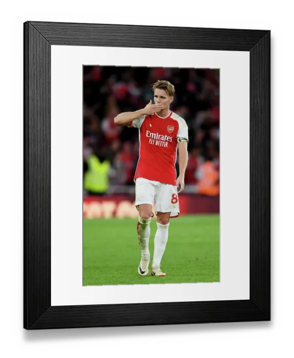 Framed Print : Arsenal's Martin Odegaard Celebrates with Fans after Arsenal v Manchester City, 2023-24 Premier League Framed Print : Arsenal's Martin Odegaard Celebrates with Fans after Arsenal v Manchester City, 2023-24 Premier League