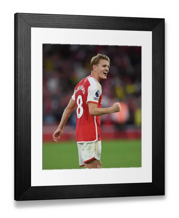 Framed Print : Arsenal Triumphs Over Manchester City: Martin Odegaard Leads Epic Victory Celebration at Emirates Stadium (2023-24)