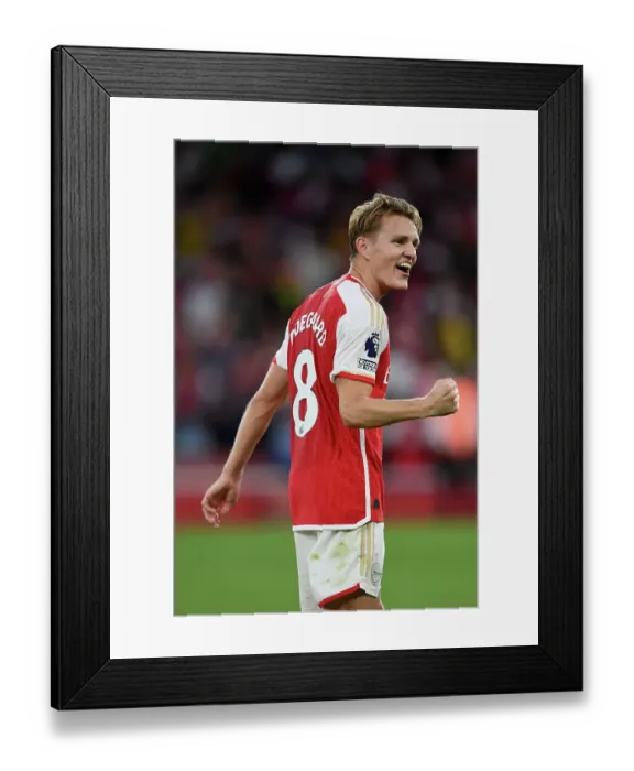 Framed Print : Arsenal Clinch Premier League Title: Martin Odegaard's Triumphant Victory Celebration vs. Manchester City (2023-24) Framed Print : Arsenal Clinch Premier League Title: Martin Odegaard's Triumphant Victory Celebration vs. Manchester City (2023-24)