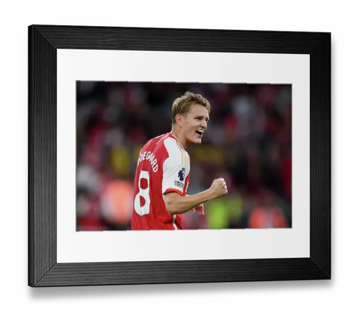 Framed Print : Martin Odegaard's Emotional Victory: Arsenal's Premier League Triumph over Manchester City (2023-24) Framed Print : Martin Odegaard's Emotional Victory: Arsenal's Premier League Triumph over Manchester City (2023-24)