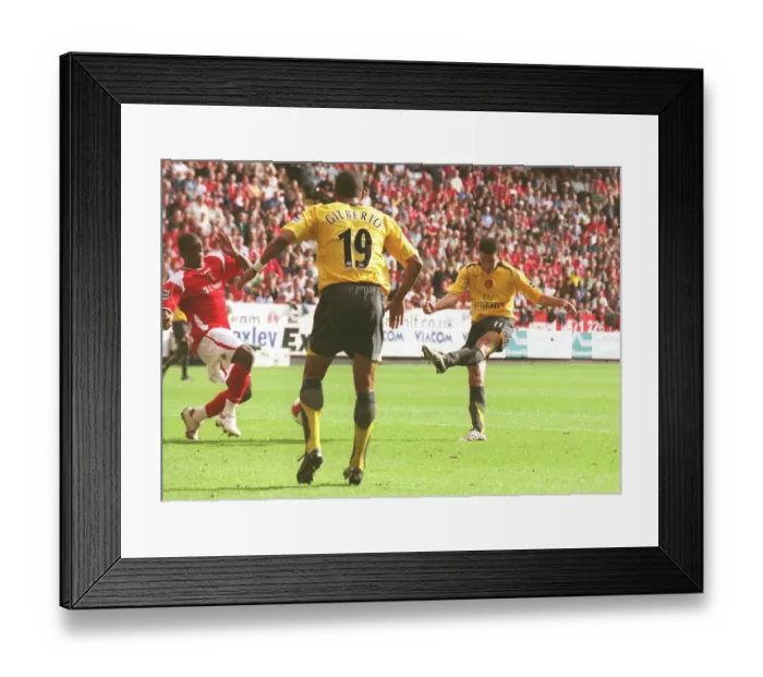 Framed Print : Robin van Persie shoots past Scott Carson to score the 1st Arsenal goal Framed Print : Robin van Persie shoots past Scott Carson to score the 1st Arsenal goal