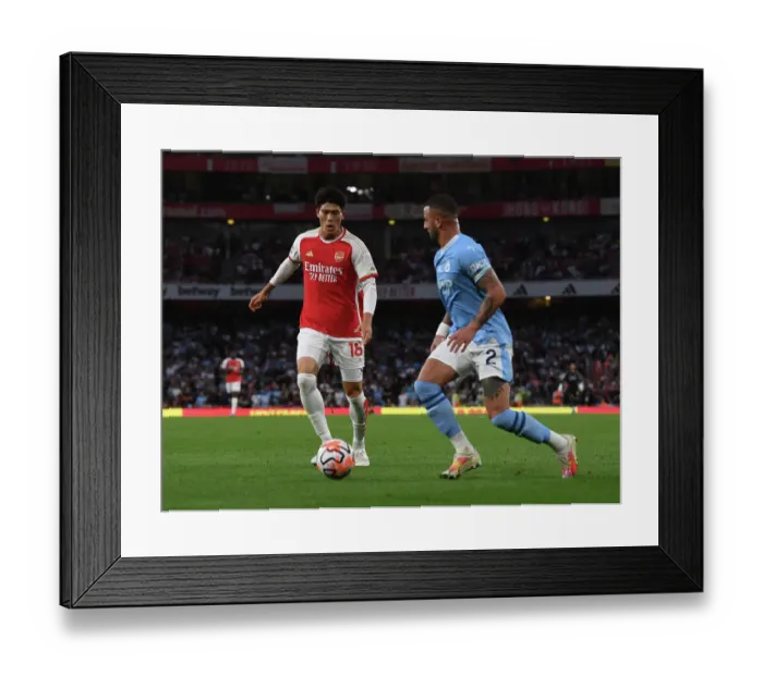 Framed Print : Clash of Titans: Tomiyasu vs Walker - Arsenal vs Manchester City Showdown (2023-24)