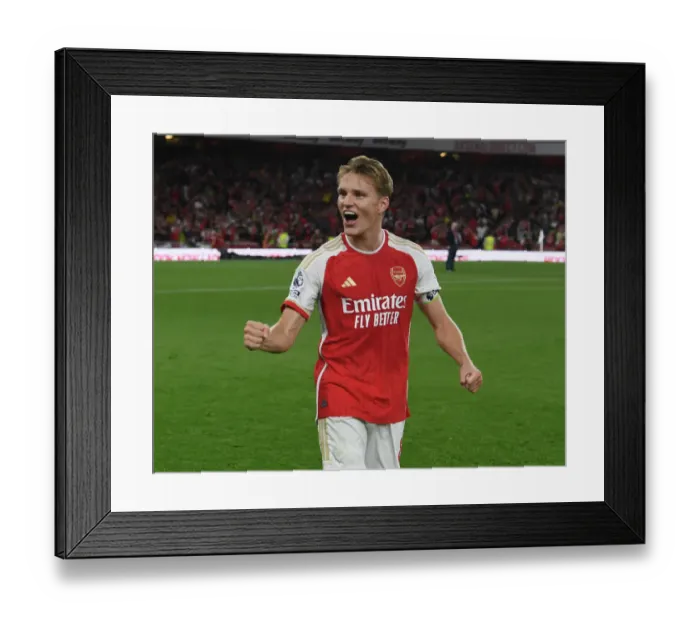 Framed Print : Martin Odegaard's Triumph: Arsenal's Historic Victory Over Manchester City in the 2023-24 Premier League