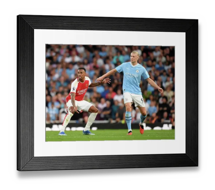 Framed Print : Arsenal's Gabriel Holds Off Manchester City's Haaland in Intense Premier League Clash (2023-24)