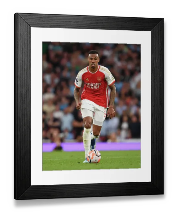 Framed Print : Arsenal's Gabriel Sprints Past Manchester City: Premier League Showdown at Emirates Stadium (2023-24)