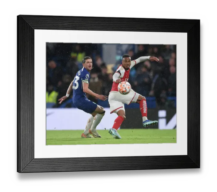 Framed Print : Gabriel Magalhaes vs Conor Gallagher: Intense Battle at Stamford Bridge - Chelsea vs Arsenal, Premier League 2023-24