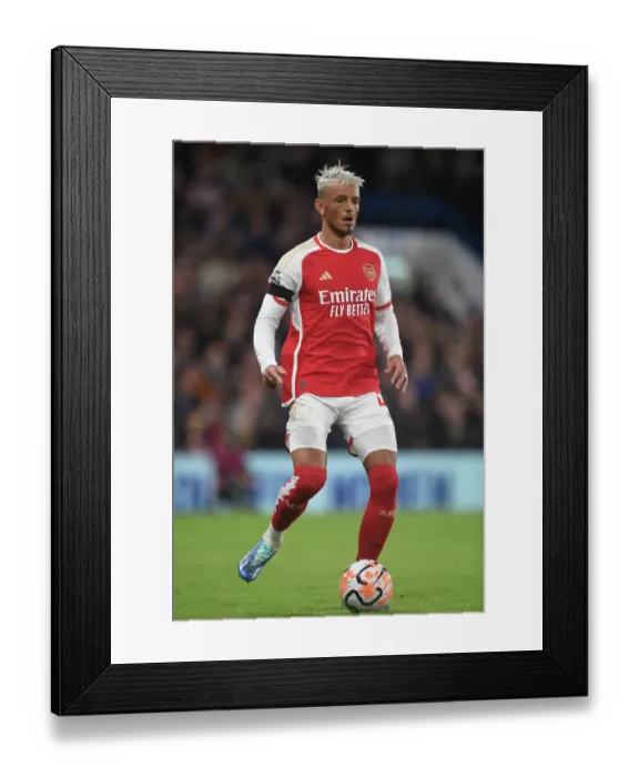Framed Print : Arsenal's Ben White Faces Off Against Chelsea in Intense 2023-24 Premier League Showdown