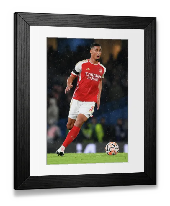 Framed Print : Saliba Charges Forward: Chelsea vs. Arsenal, Premier League 2023-24 Framed Print : Saliba Charges Forward: Chelsea vs. Arsenal, Premier League 2023-24