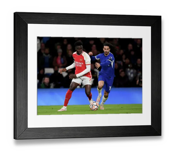 Framed Print : Clash at Stamford Bridge: Arsenal's Bukayo Saka Faces Off Against Chelsea's Marc Cucurella (2023-24) Framed Print : Clash at Stamford Bridge: Arsenal's Bukayo Saka Faces Off Against Chelsea's Marc Cucurella (2023-24)