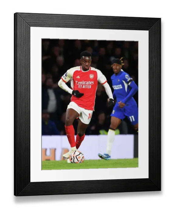 Framed Print : Arsenal's Eddie Nketiah Chases the Ball against Chelsea in the 2023-24 Premier League Clash