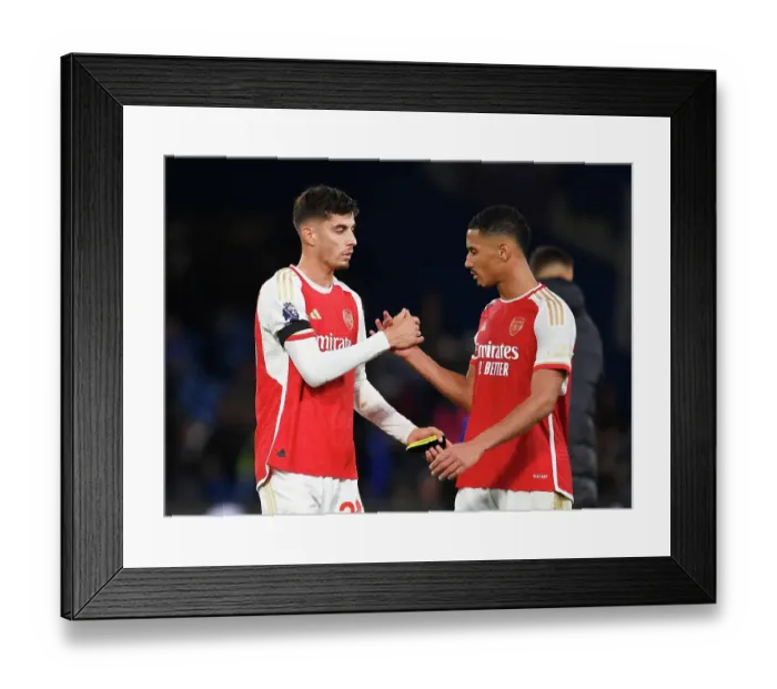 Framed Print : Arsenal's Havertz and Saliba Share a Moment After Chelsea Showdown (2023-24 Premier League)
